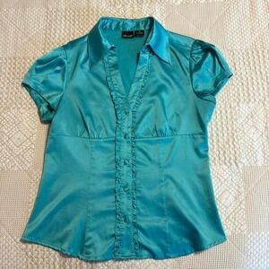 Y2K Willi Smith blue satin blouse with ruffle details and button-up front.